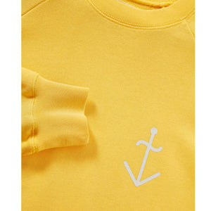 La Paz Cunha yellow ecru logo