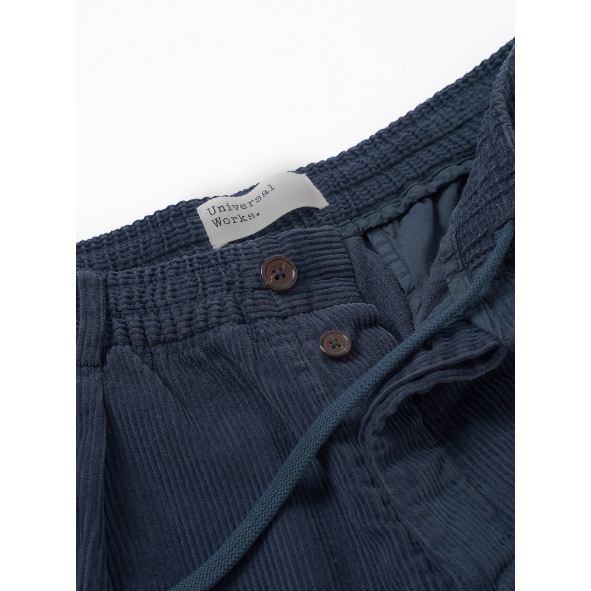 Universal Works Pleated Track Pant cord dark navy